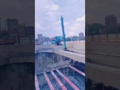 Excavadora con brazo telescópico de tres secciones